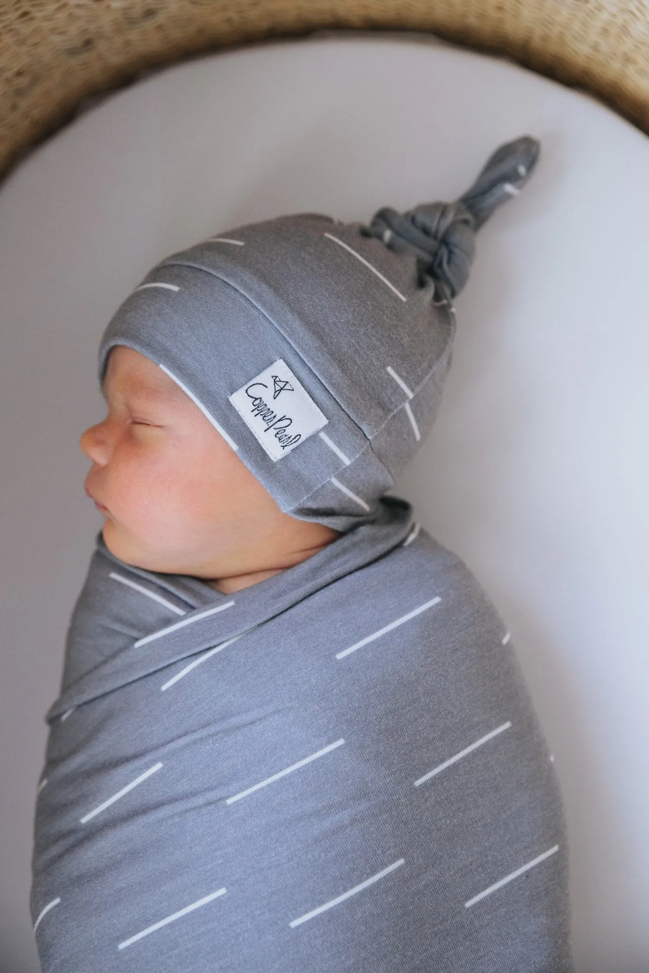 Copper Pearl Dash Top Knot Hat