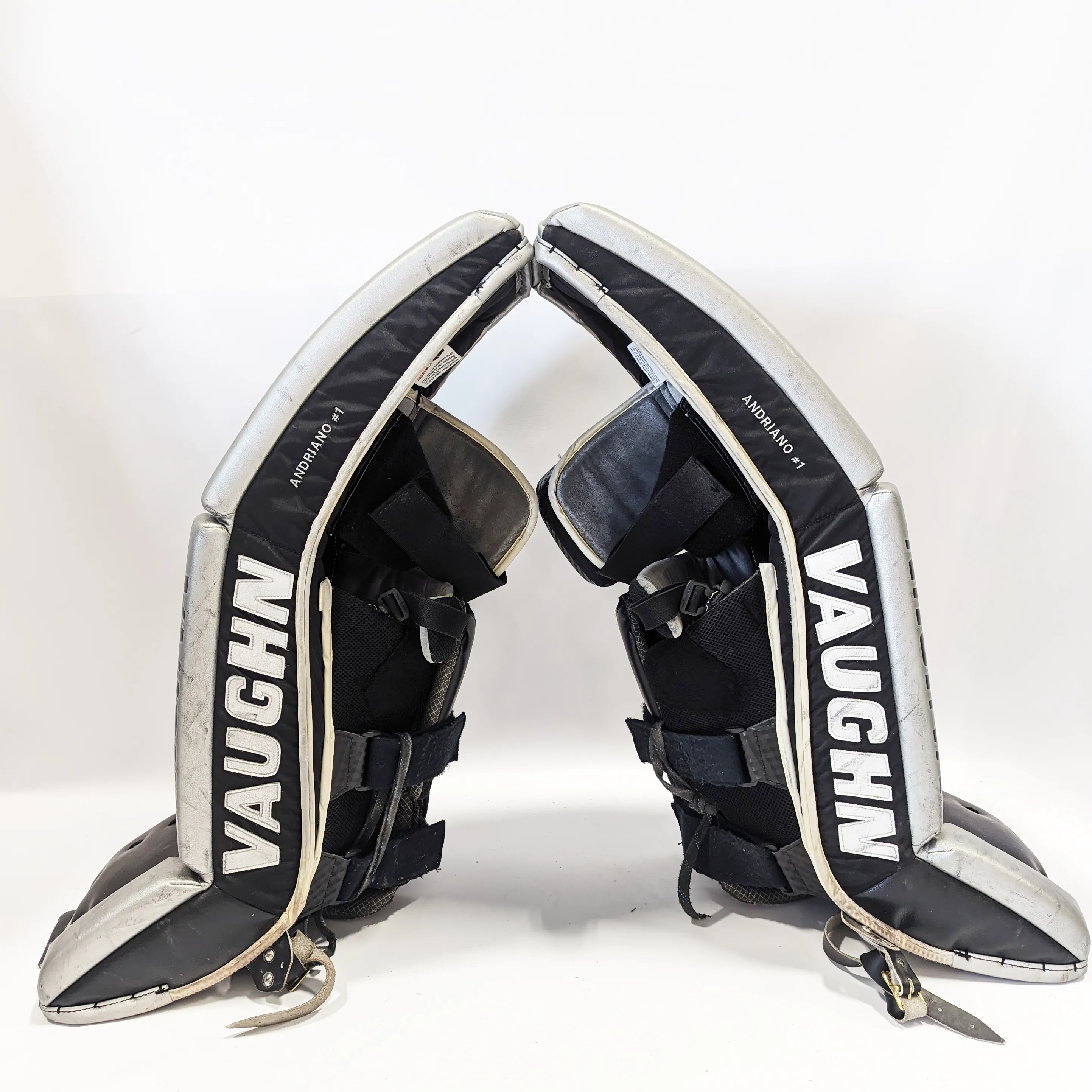 Vaughn Velocity VE8 - Used NCAA Pro Stock Goalie Pads (Black/Orange/Grey)